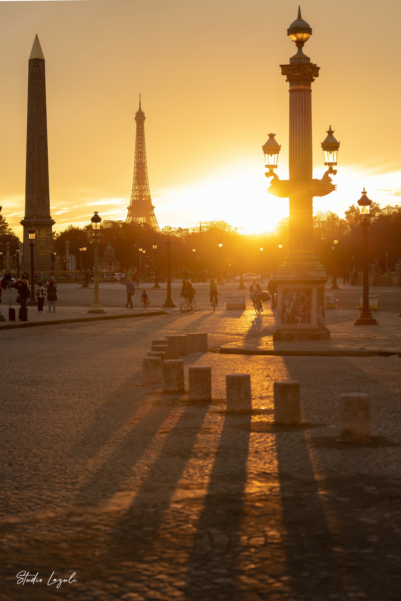 Photo of the Place de la Concorde, capturing the oblique autumn light and long, stretching shadows.